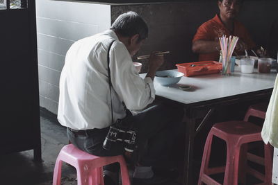 Side view of people at restaurant