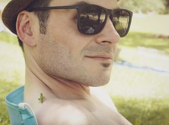 Close-up of young man wearing sunglasses