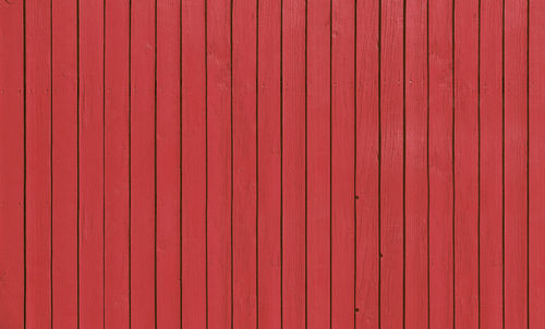 Full frame shot red boards wall