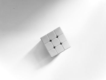 High angle view of stuffed toy over white background