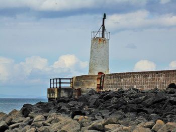 Below the harbour wall