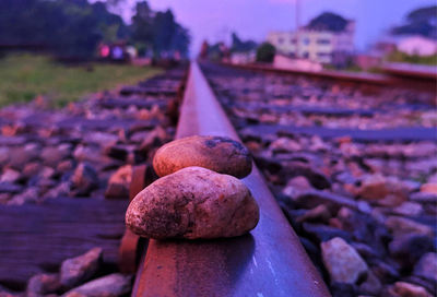 Close-up of stones on railroad track