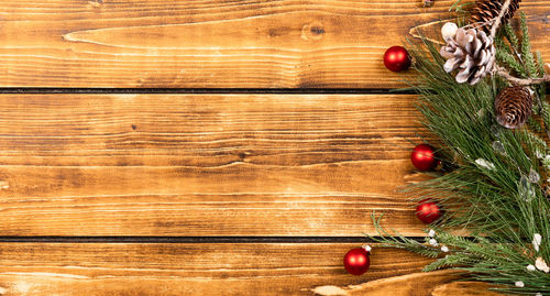 View of christmas tree on wooden table