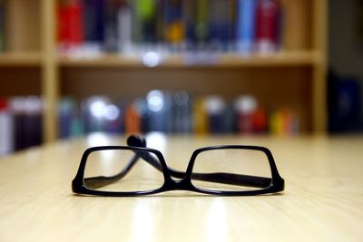 Close-up of eyeglasses on table