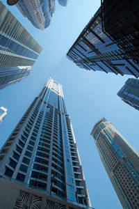 Low angle view of modern buildings against sky