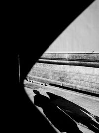 Shadow of railing on wall