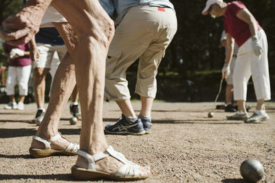 People playing pétanque