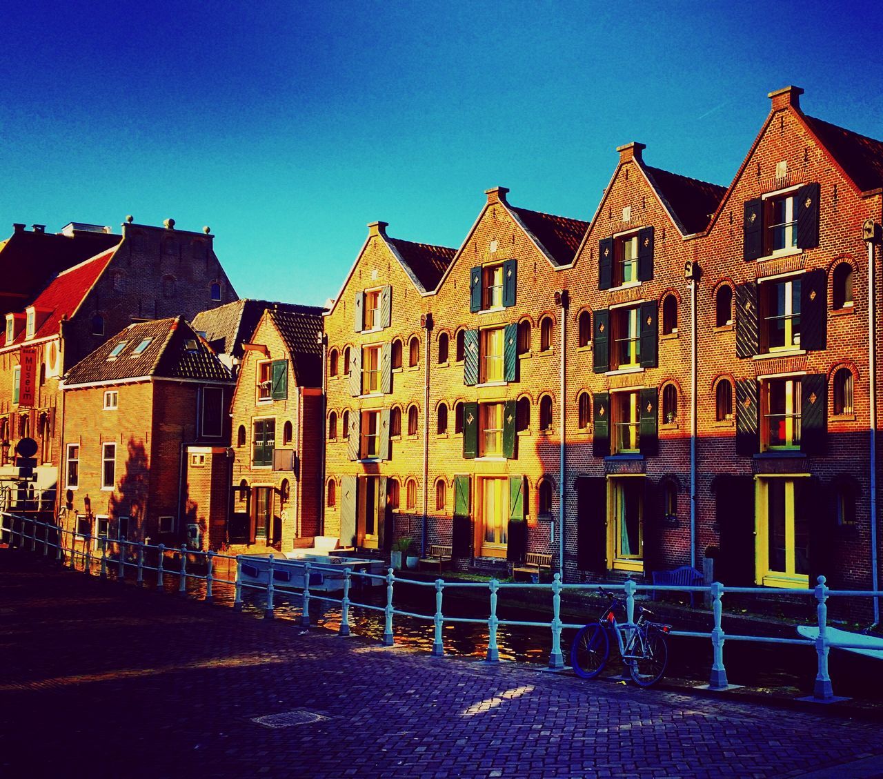 BUILDINGS AGAINST BLUE SKY