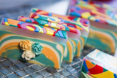 Close-up of multi colored candies on table