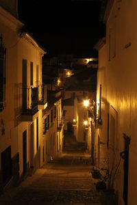 Illuminated street lights at night