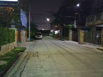 Cars on road in city at night