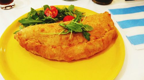 Close-up of bread in plate on table