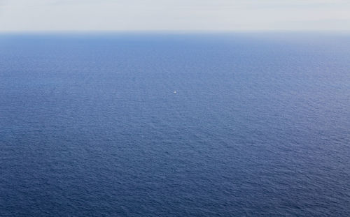 High angle view of blue sea against sky