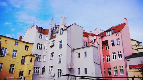 Low angle view of building against blue sky