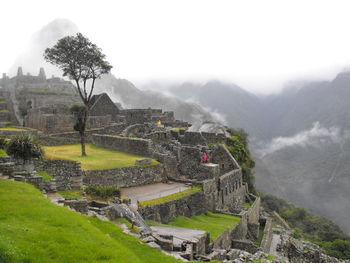 Scenic view of mountains in foggy weather