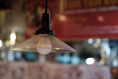 Close-up of illuminated light bulb