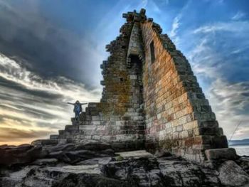 Low angle view of old ruins against clear sky