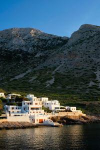 Kamares town with traditional white houses on sifnos island on sunset. greece