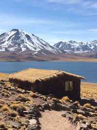 Scenic view of secluded cabin at the foot of chilean mountain 