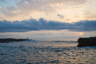 Scenic view of sea against sky during sunset