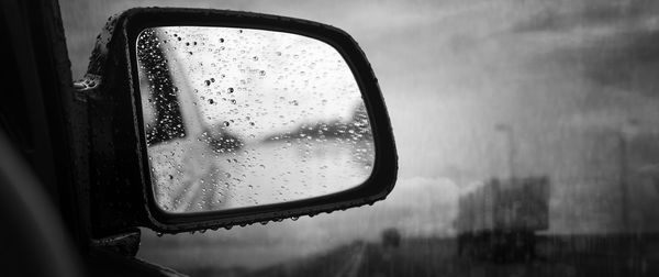 Close-up of wet glass window