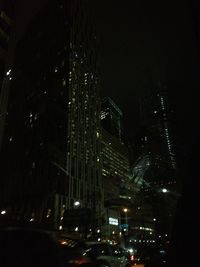 Skyscrapers in city at night