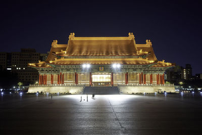 Illuminated national concert hall building at night