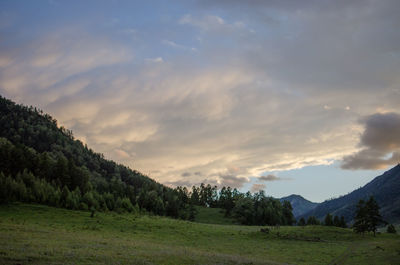 Scenic view of landscape against sky during sunset