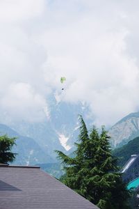 Scenic view of tree mountains against sky