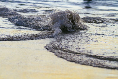 Close-up of wave on beach
