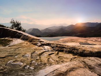 Scenic view of landscape against sky during sunset