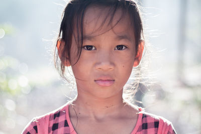 Portrait of cute girl outdoors