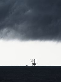 Oil platform with storm clouds 1