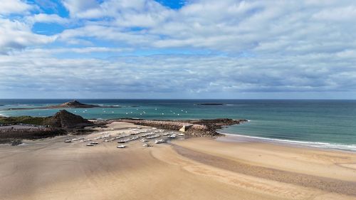 Scenic view of beach against sky