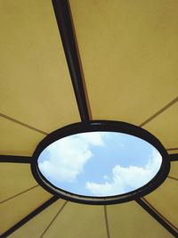 Low angle view of metallic structure against sky