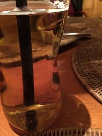 Close-up of wine glasses on table