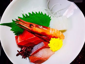 Close-up of fruit over white background