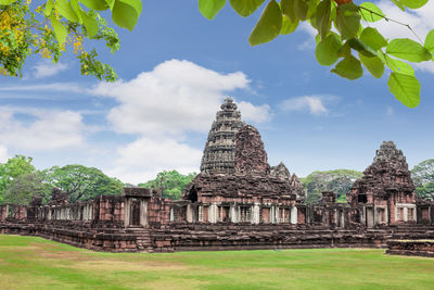 View of temple against cloudy sky