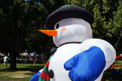 Inflatable snowman at park