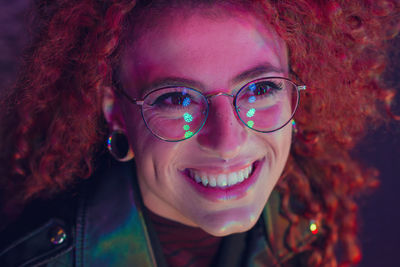 Close-up of woman wearing eyeglasses