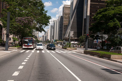 Cars on road in city