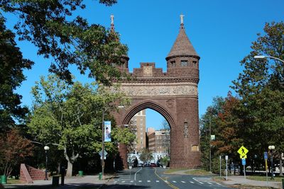 Archway against clear sky in city