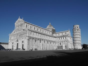 Low angle view of historical building against blue sky