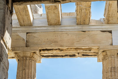 Low angle view of old parthenon ruin building at the acropolis in athens, greece.