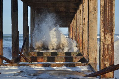 View of metallic structure by sea