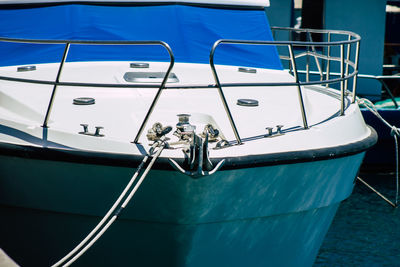 People in boat sailing on sea