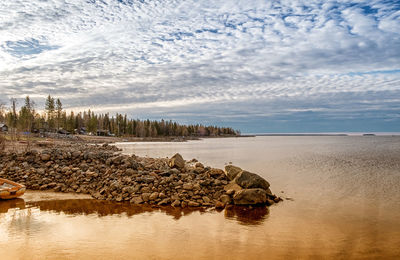 Scenic view of beach against sky