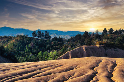 Panoramic view of landscape against sky during sunset