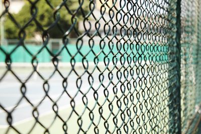 Close-up of chainlink fence outdoors