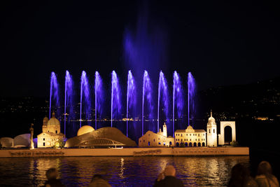 Panoramic view of illuminated buildings at night